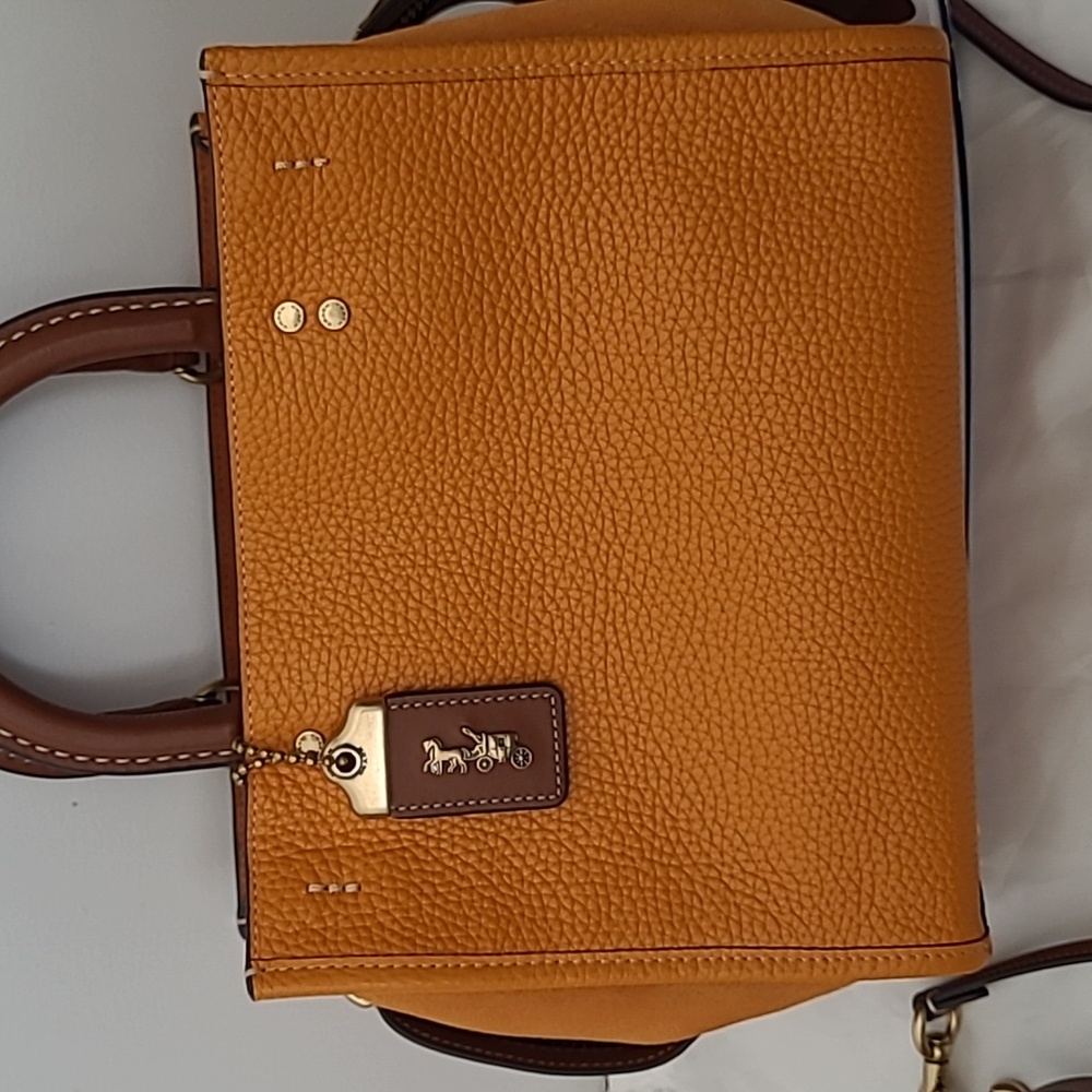 Coach 1941 Papaya Rogue 25, 15"W x 9"H, Like new, excellent clean  condition